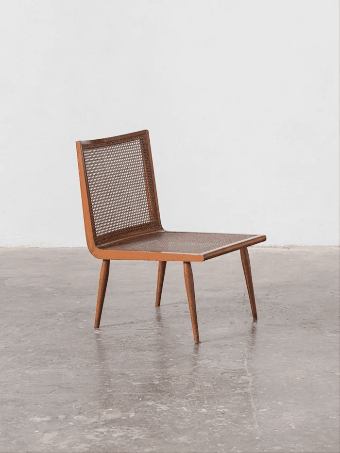 Mid-century cane chair in warm sunlight